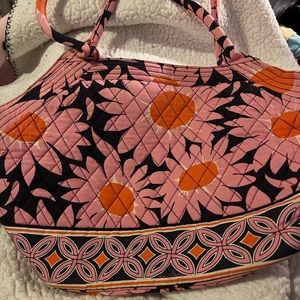 This is a Vera Bradley loves me pattern purse